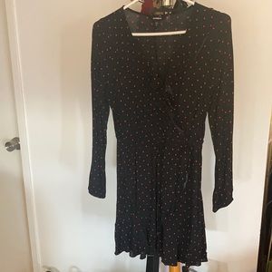 Red polka dotted black dress